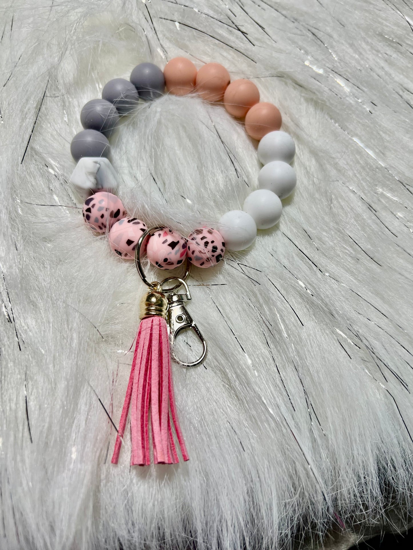 pink print, gray and peach wristlet