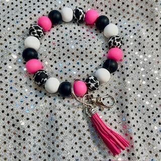 pink, black and white wristlet